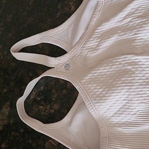 Gently used Lulu lemon tank with built in bra. Light pink sz 8 but I removed tag